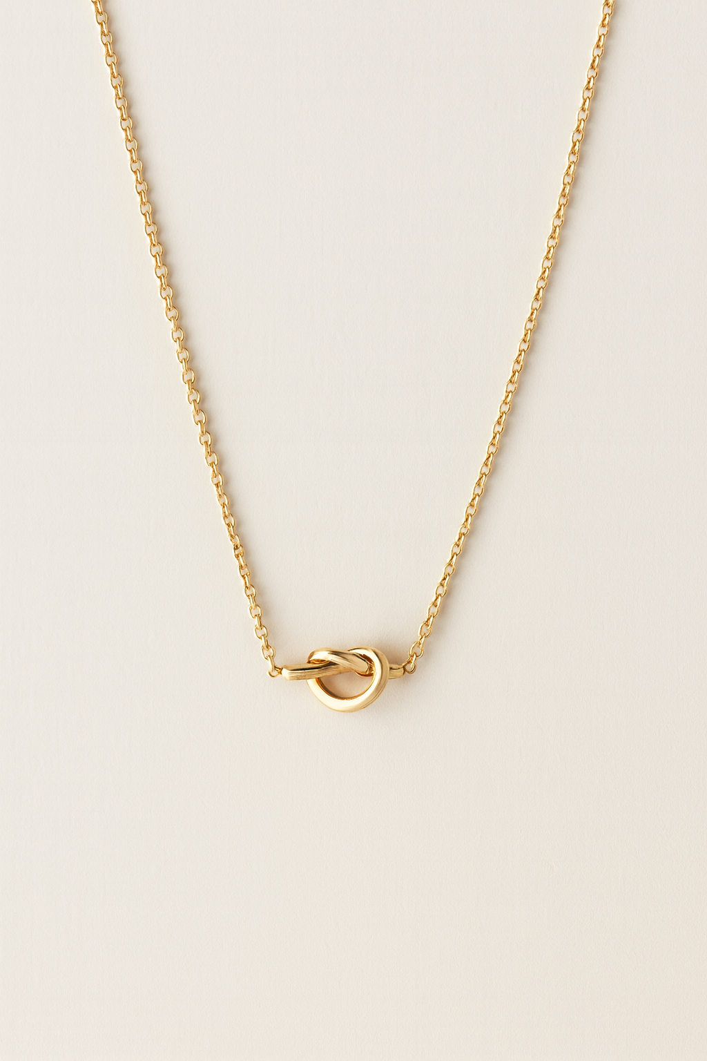 Refined Gleam Knot Charm Necklace by Caevi – hypoallergenic jewelry