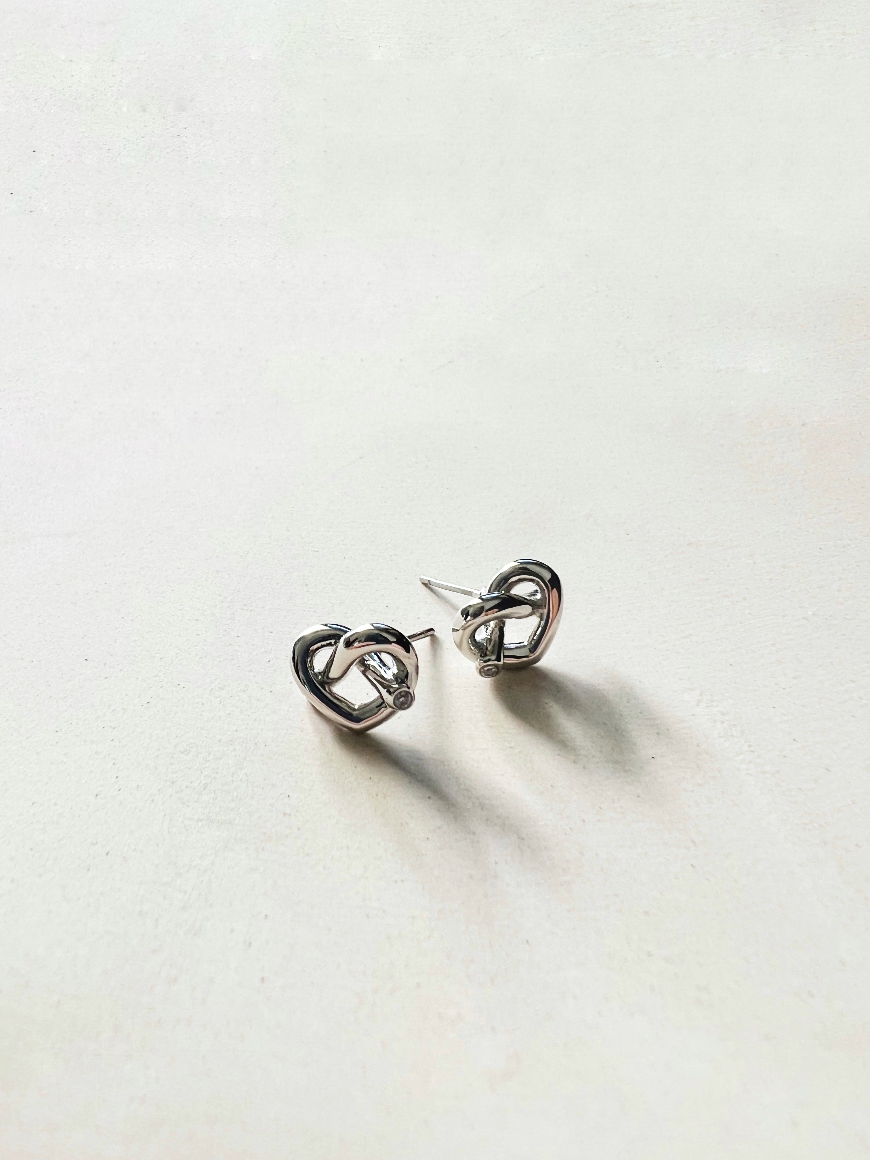 Modern KYRA HEART EAR STUDS by Caevi – hypoallergenic jewelry
