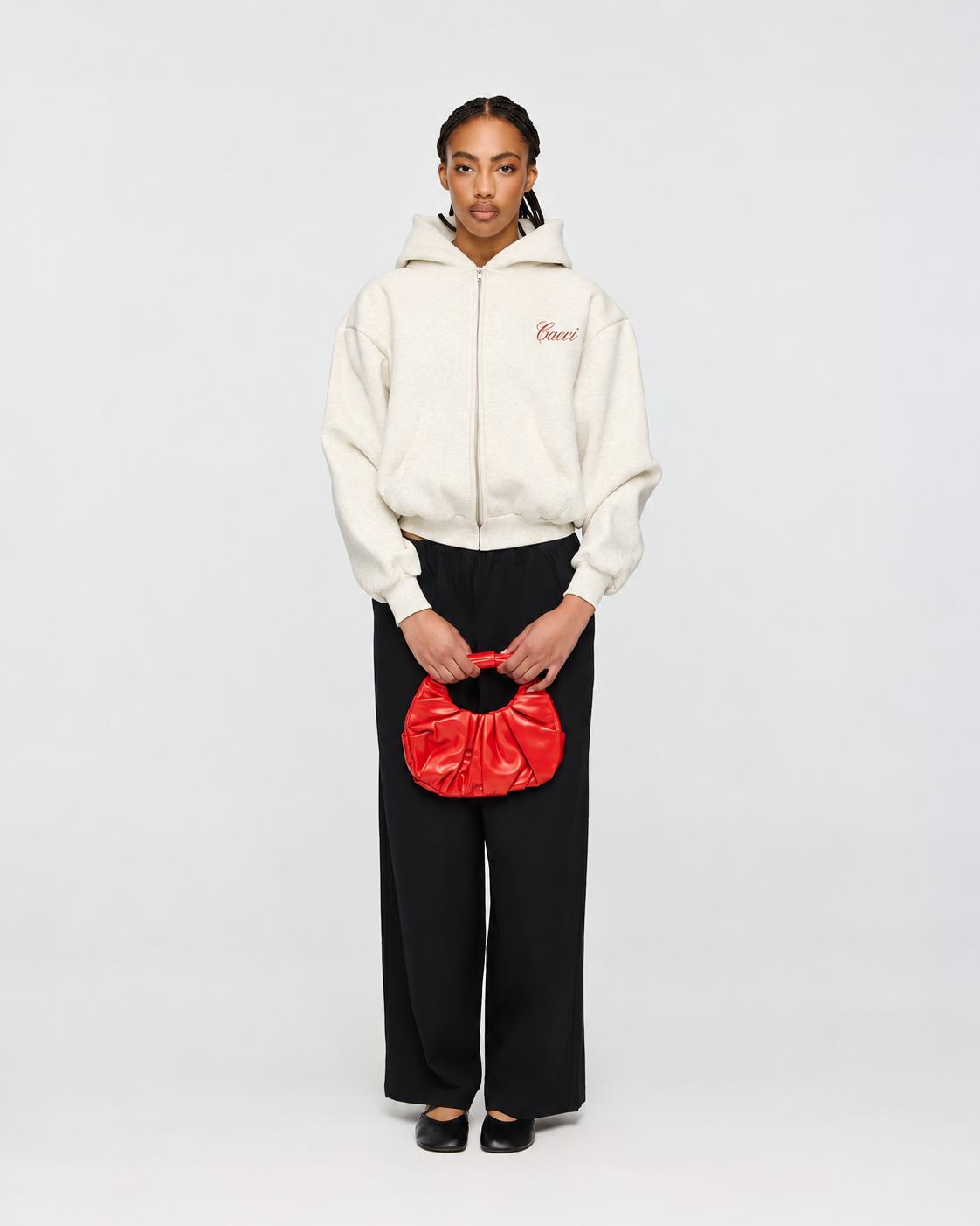 CAEVI Script Heavyweight Zip-Up Hoodie in Marle Oatmeal – model styling view
