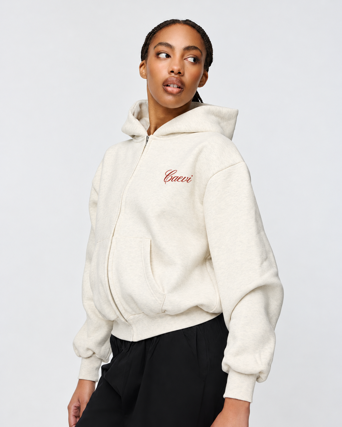 CAEVI Script Heavyweight Zip-Up Hoodie in Marle Oatmeal – model styling view