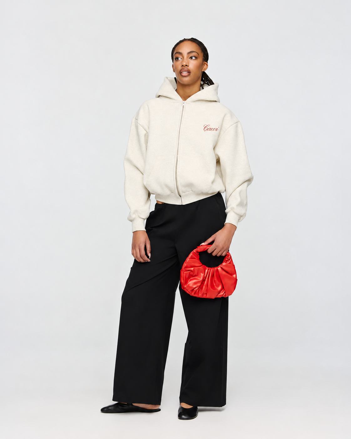 CAEVI Script Heavyweight Zip-Up Hoodie in Marle Oatmeal – model styling view