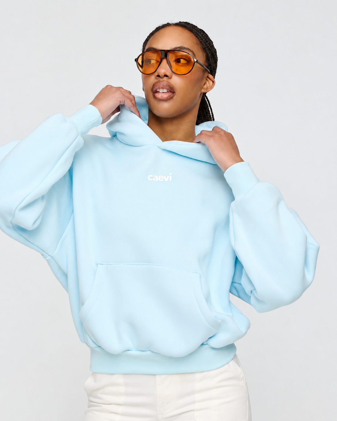 CAEVI Essential Heavyweight Hoodie in Powder Blue – model styling view