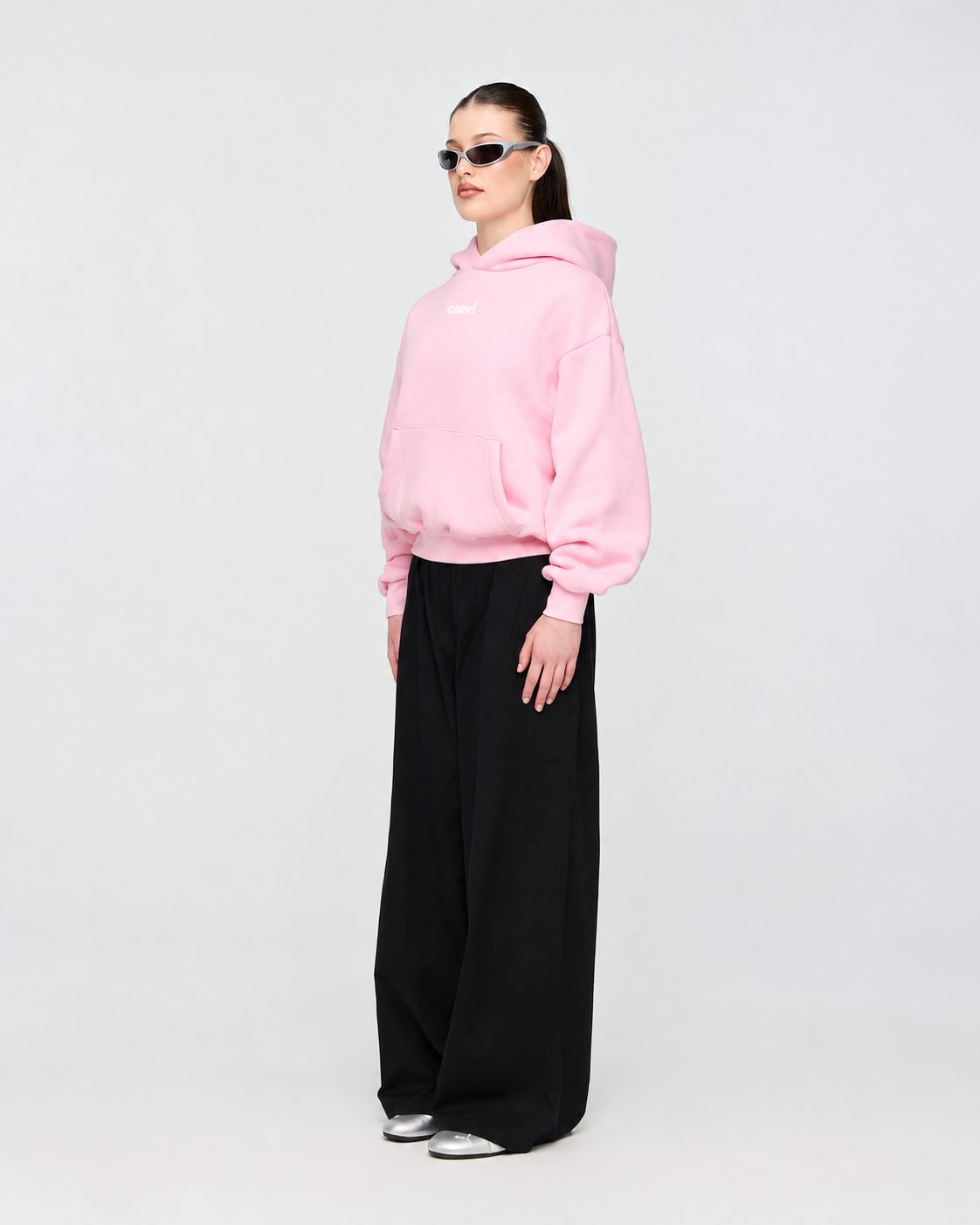 CAEVI Essential Heavyweight Hoodie in Powder Pink – model styling view