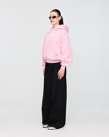 CAEVI Essential Heavyweight Hoodie in Powder Pink – model styling view