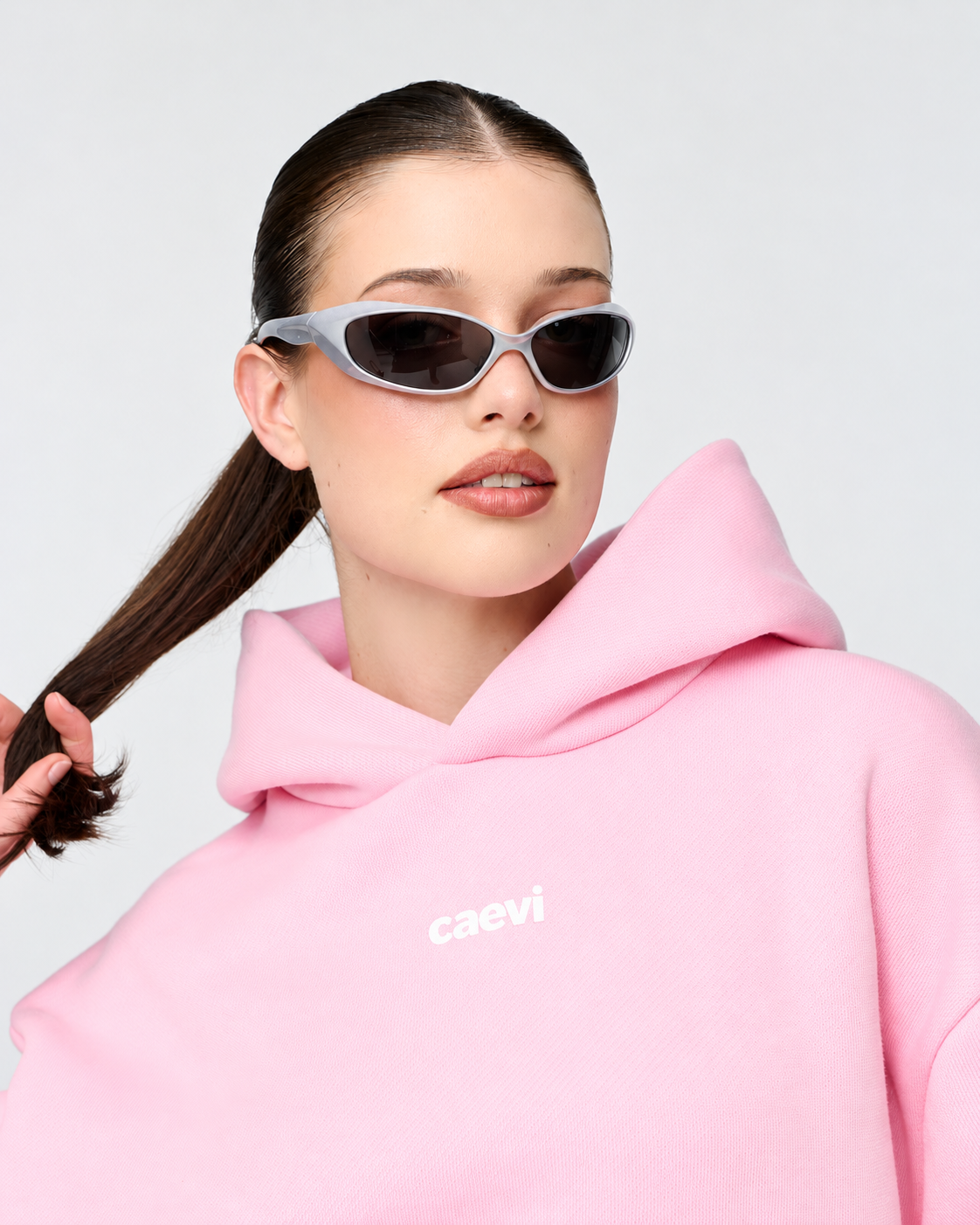 CAEVI Essential Heavyweight Hoodie in Powder Pink – model styling view