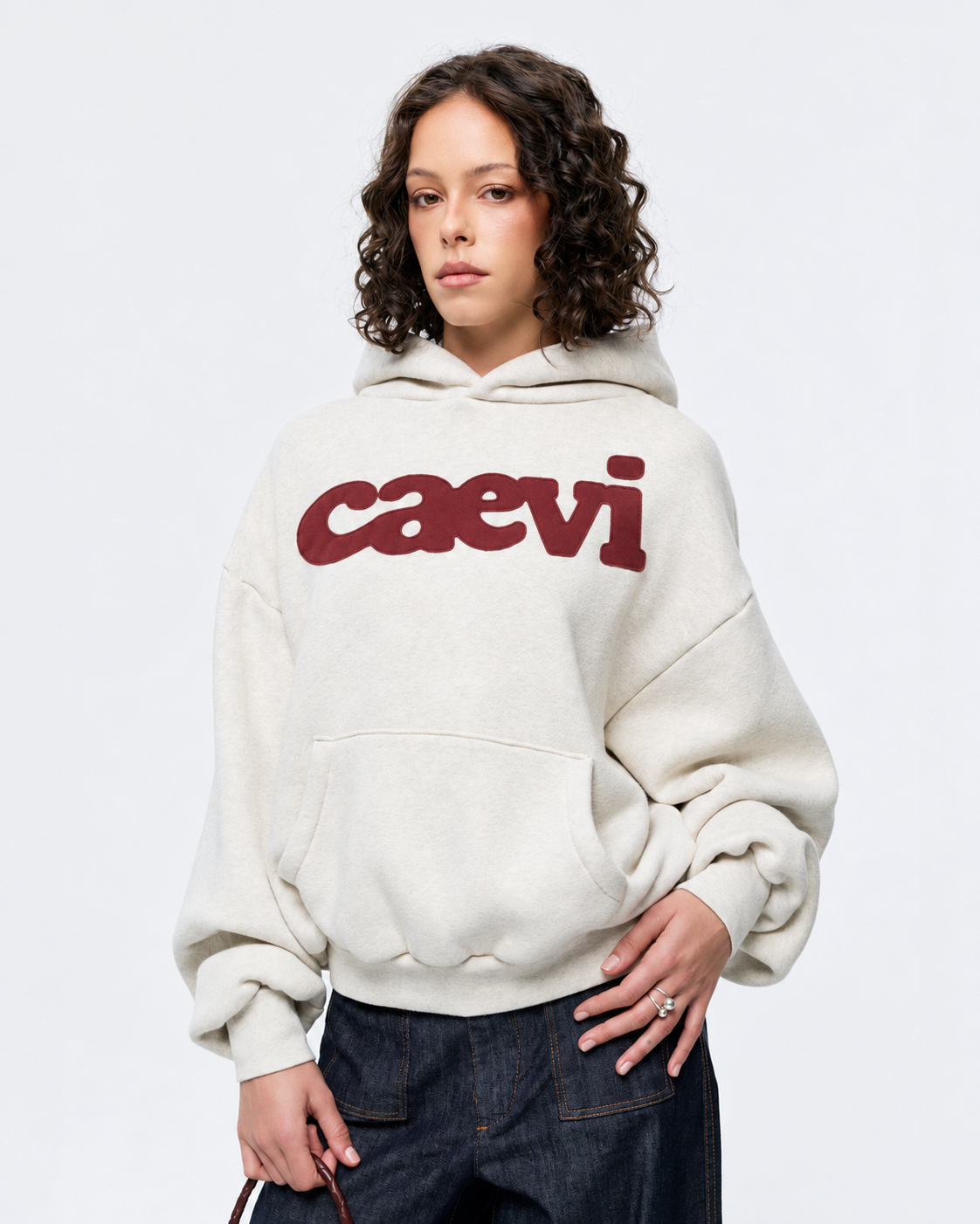 CAEVI Statement Heavyweight Hoodie in Oatmeal – model styling view