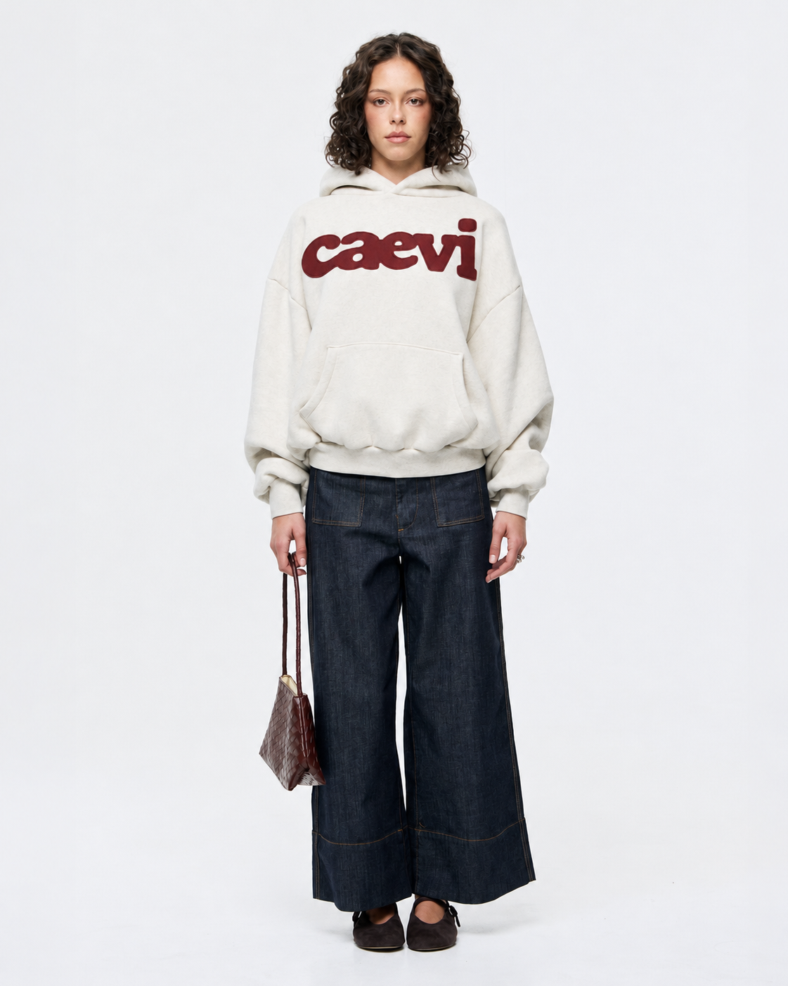 CAEVI Statement Heavyweight Hoodie in Oatmeal – model styling view