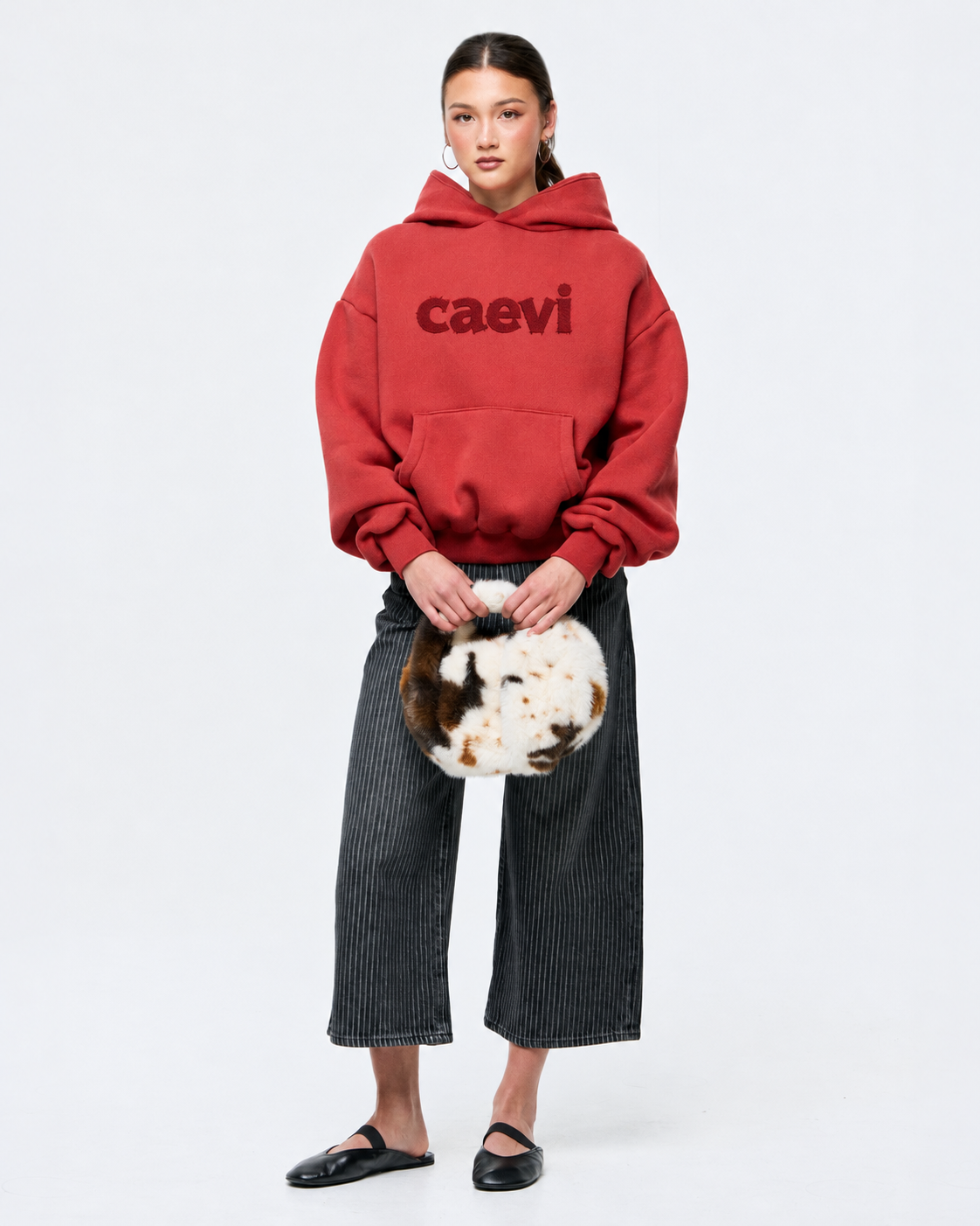 CAEVI Appliqué Heavyweight Hoodie in Crimson – model styling view