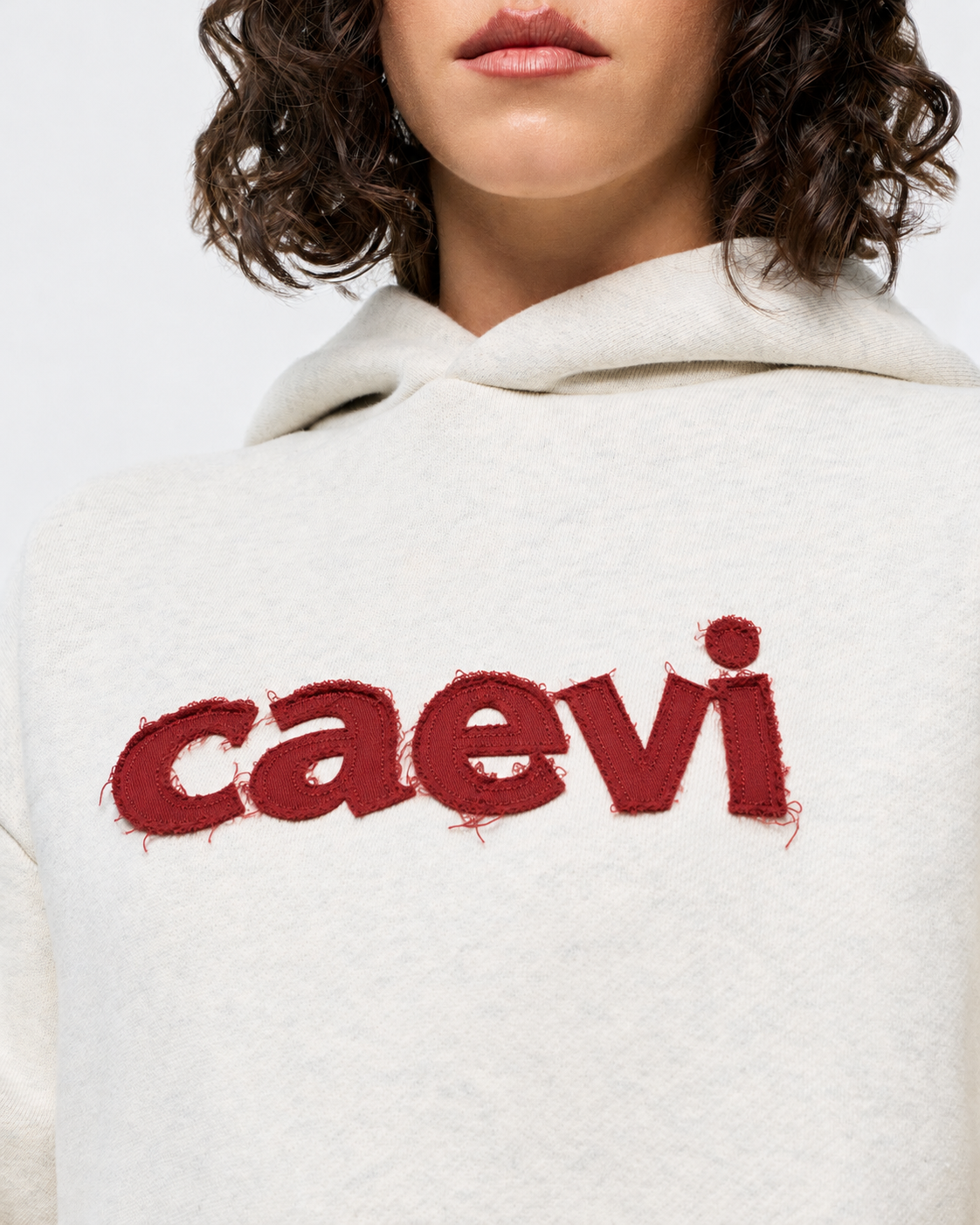 CAEVI Appliqué Heavyweight Hoodie in Oatmeal – model styling view