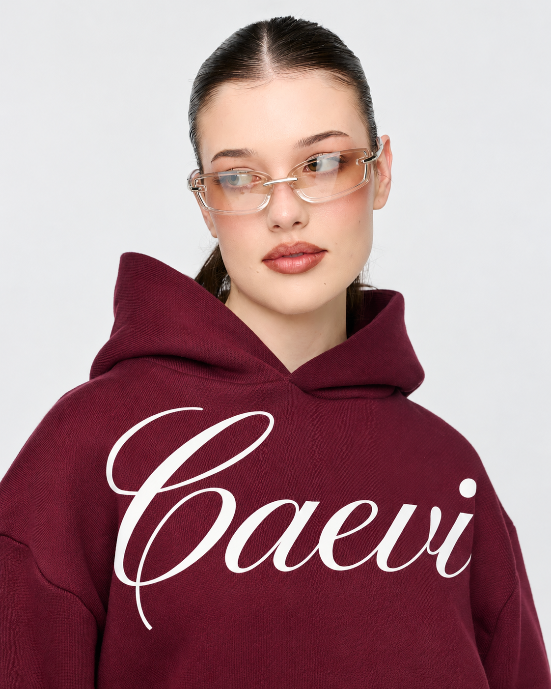 CAEVI Calligraphy Heavyweight Hoodie in Plum – model styling view